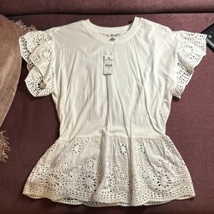 NWT. Eyelet sleeves and bottom. Gathered at the waist.